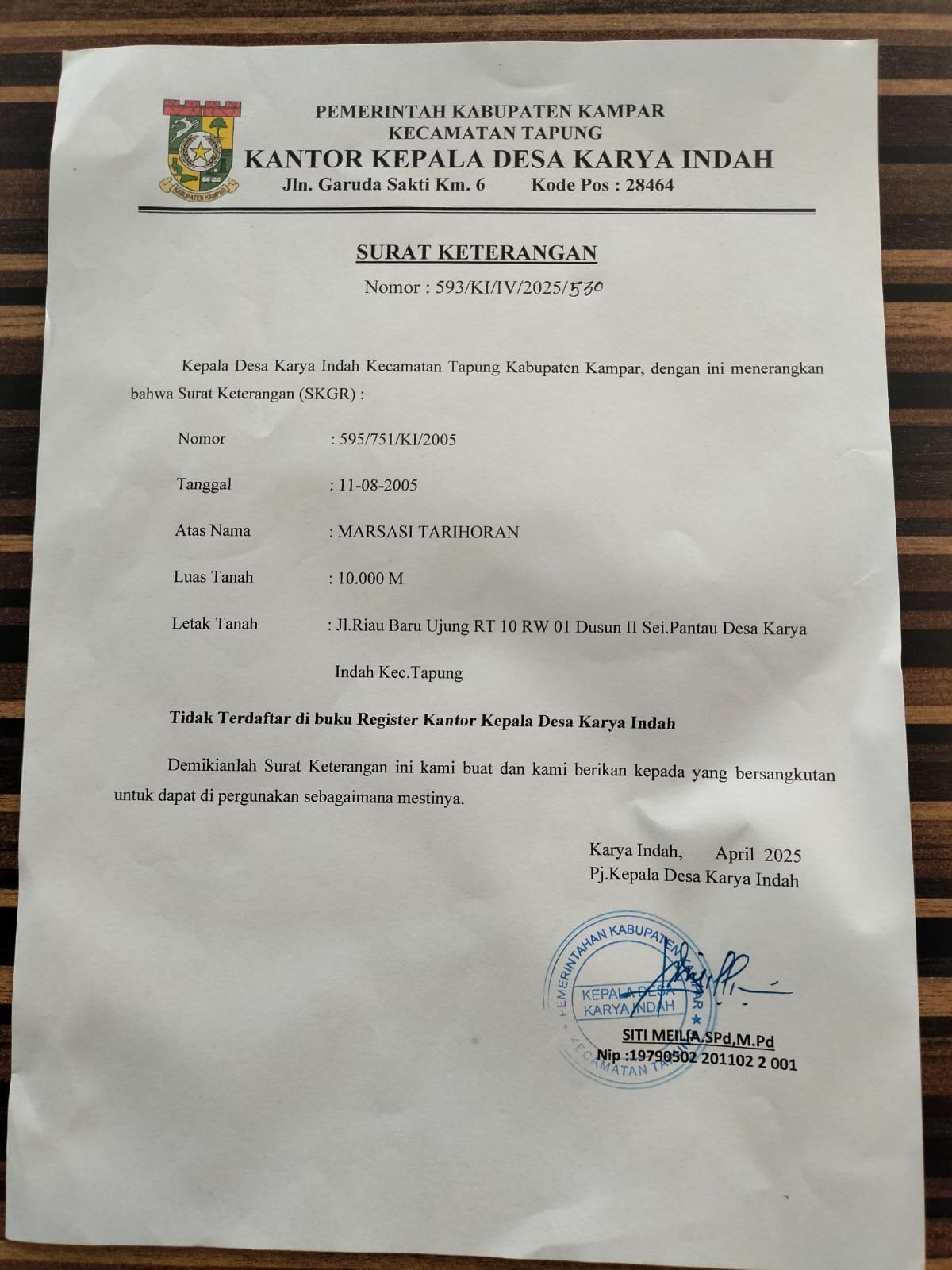 Keterangan Foto Dukungan: SURAT KETERANGAN dari Kantor Desa Karya Indah.