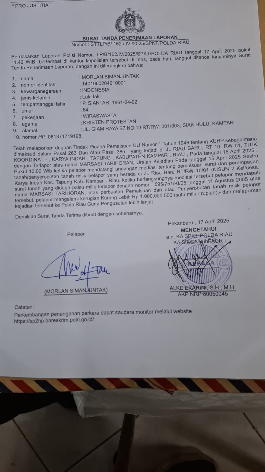 Keterangan Foto Tambahan: LAPORAN POLISI (LP) dari SPKT POLDA Riau.