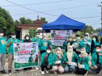 Universitas Hang Tuah Pekanbaru Bagikan Masker ke Masyarakat Terdampak Asap Karhutla di Rimbo Panjang